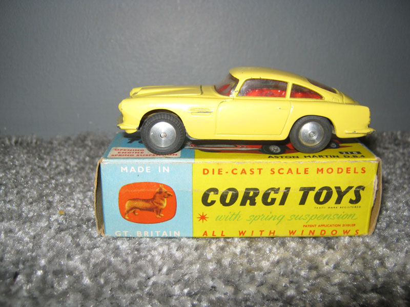 Corgi Toys 218 Aston Martin D.B.4. Primrose Yellow Body with Bonnet Vent, Red Interior