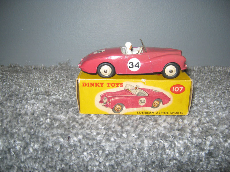 Dinky Toys 107 Sunbeam Alpine Sports Deep Pink Body Grey Interior Cream Hubs, R/N 34, White Racing Driver